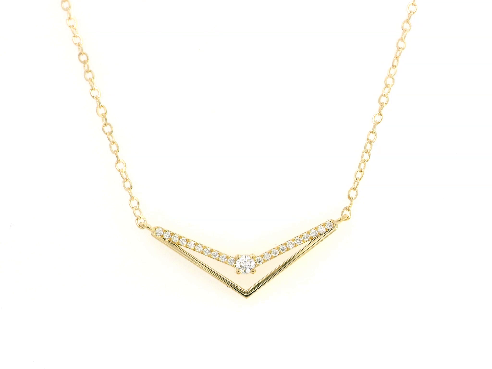 18K gold chevron diamond necklace with 0.16 carats of pavé diamonds on a V-shaped pendant, set on a delicate gold chain.