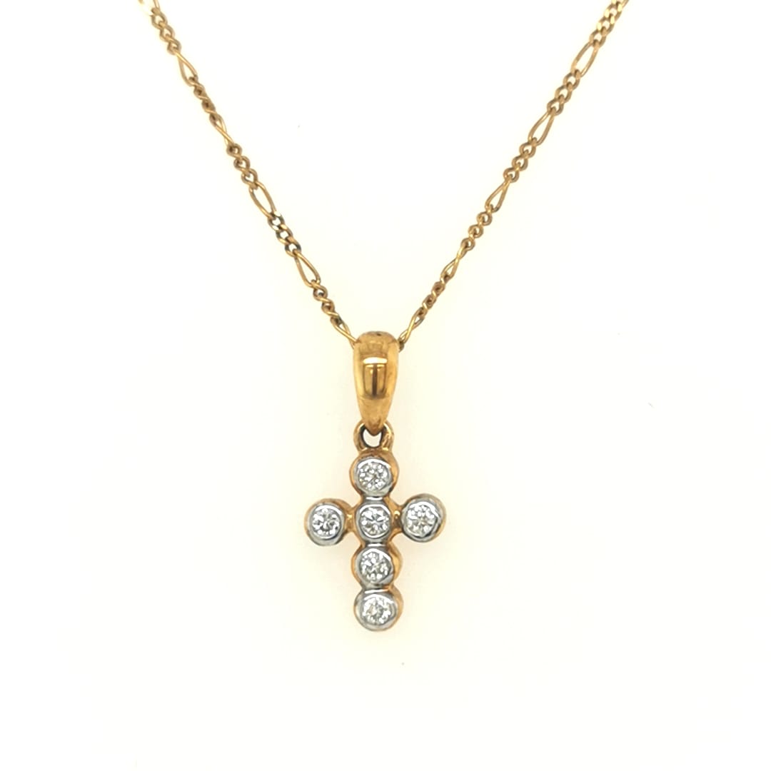 Diamond Cross Pendant In 18k Yellow Gold.