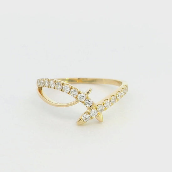 Diamond criss cross ring in 18K yellow gold by Emirates Diamonds