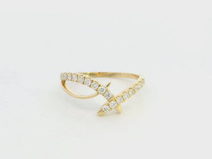 Diamond criss cross ring in 18K yellow gold by Emirates Diamonds