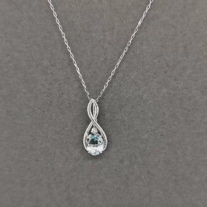 Aquamarine And Diamond Pendant In 18k White Gold.