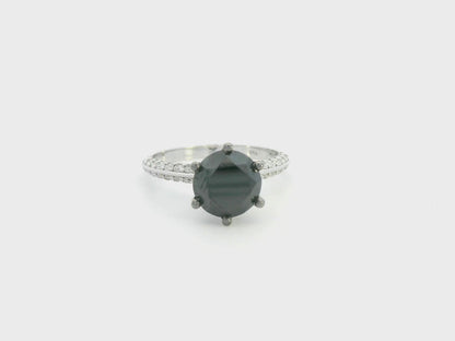 18K white gold black diamond solitaire ring with pavé diamond band by Emirates Diamonds.