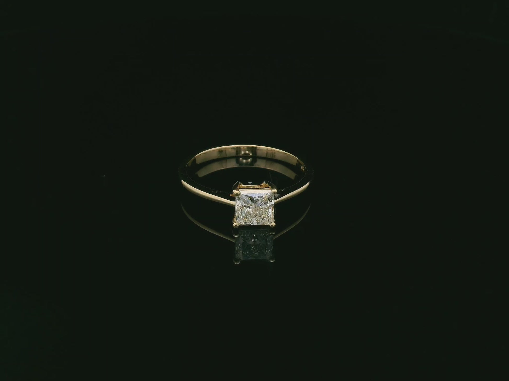 Princess cut diamond solitaire ring in 18K yellow gold by Emirates Diamonds