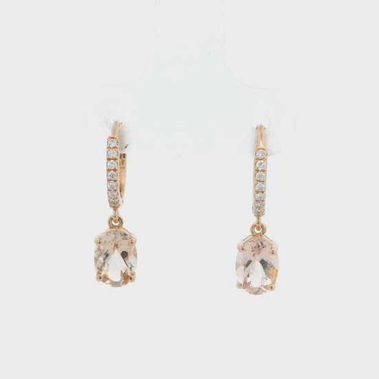 18K rose gold drop earrings featuring oval-cut morganite gemstones with diamond-accented hoops by Emirates Diamonds.