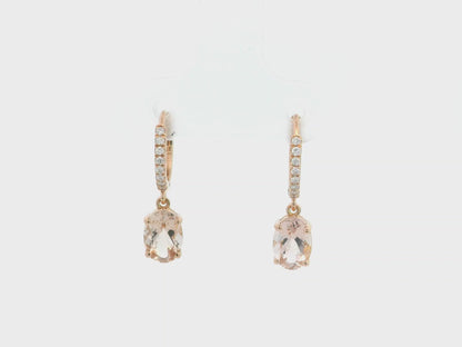 18K rose gold drop earrings featuring oval-cut morganite gemstones with diamond-accented hoops by Emirates Diamonds.