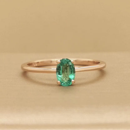 Solitaire Emerald Ring In 18k Rose Gold.