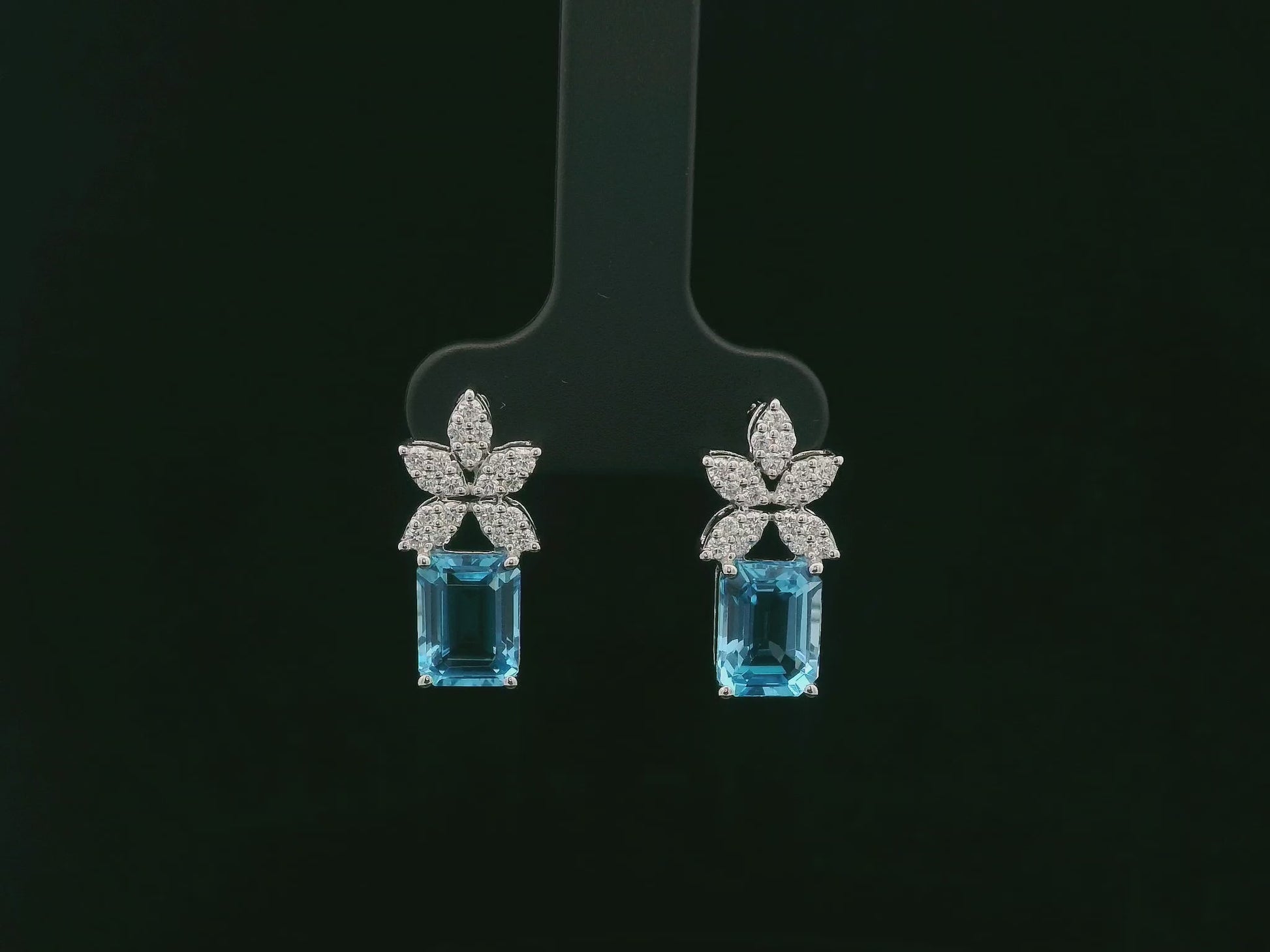 18K white gold Swiss blue topaz and diamond stud earrings with  diamond floral design – Emirates Diamonds