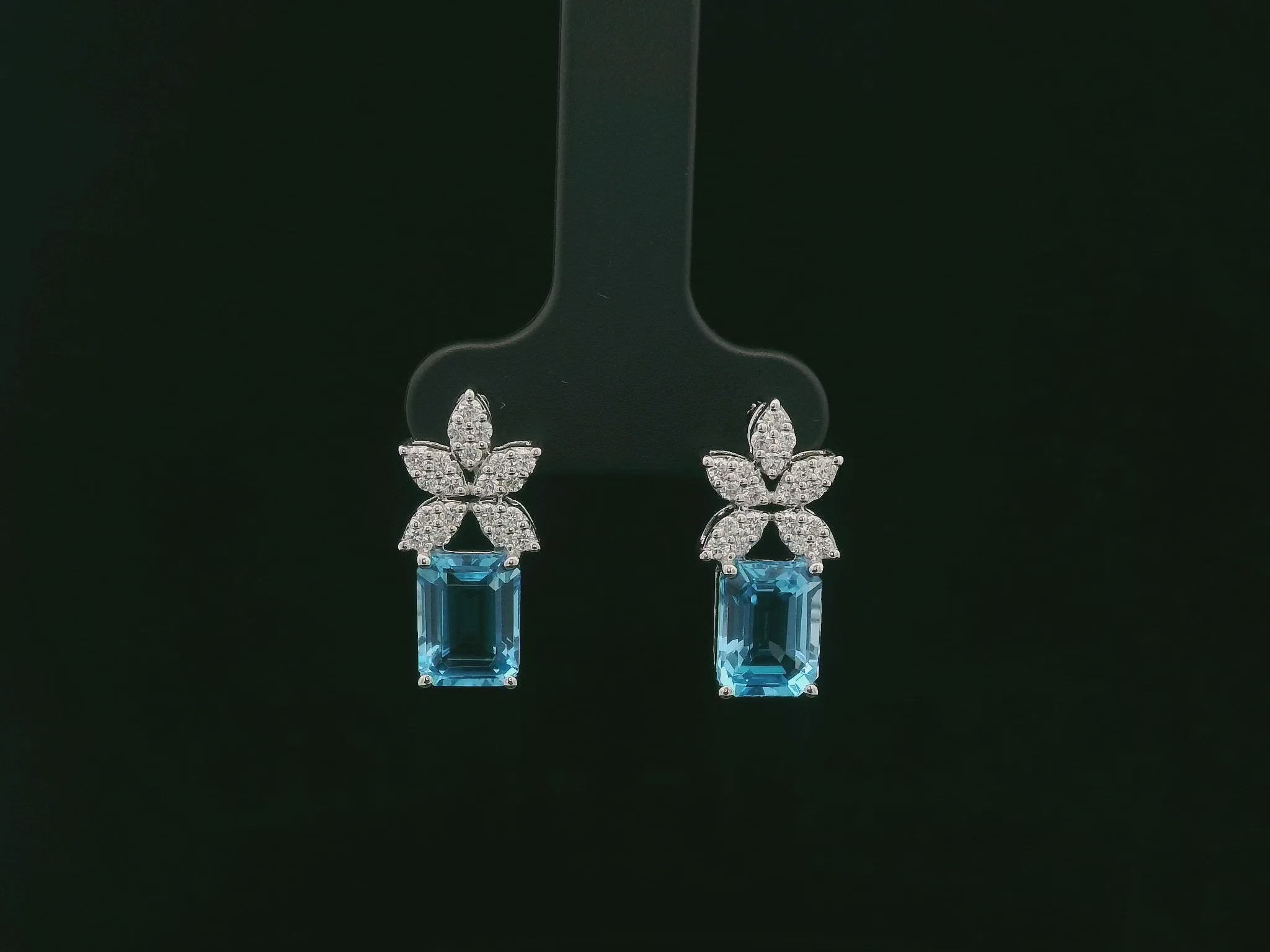 18K white gold Swiss blue topaz and diamond stud earrings with  diamond floral design – Emirates Diamonds