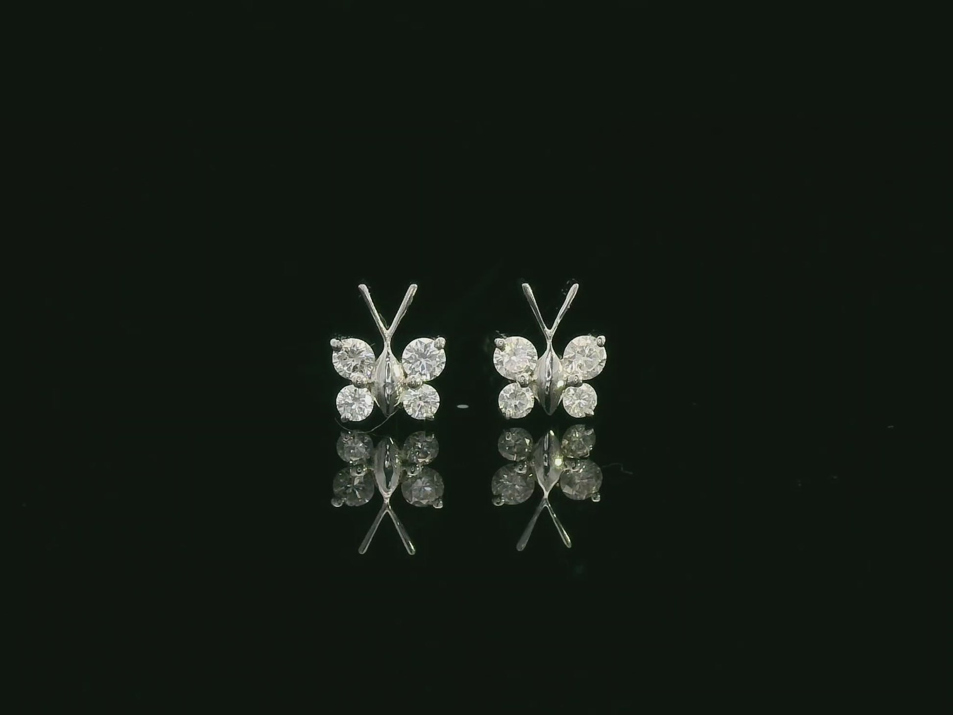 18K white gold diamond butterfly stud earrings – delicate small butterfly earrings by Emirates Diamonds