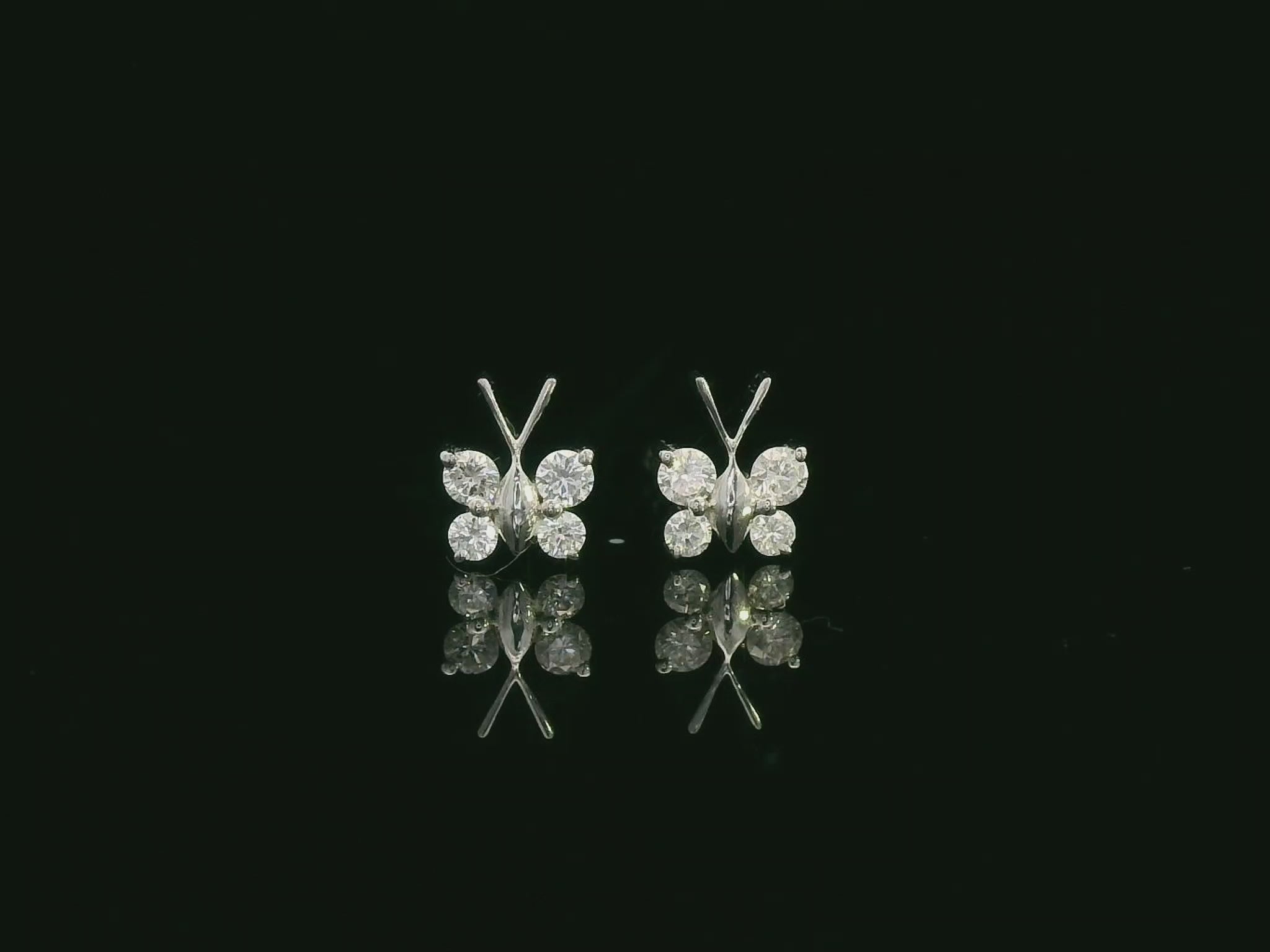 18K white gold diamond butterfly stud earrings – delicate small butterfly earrings by Emirates Diamonds