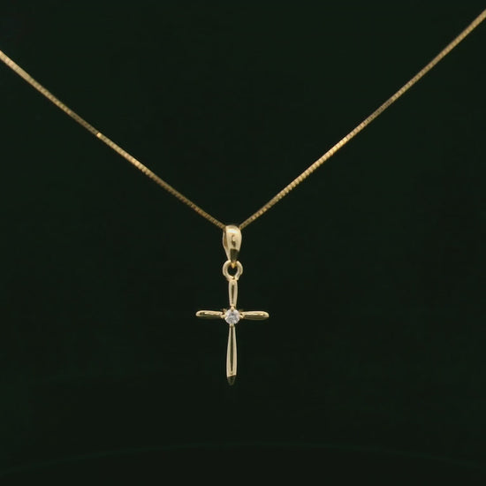 0.02 carat diamond cross pendant in 18K yellow gold minimalist necklace by Emirates Diamonds