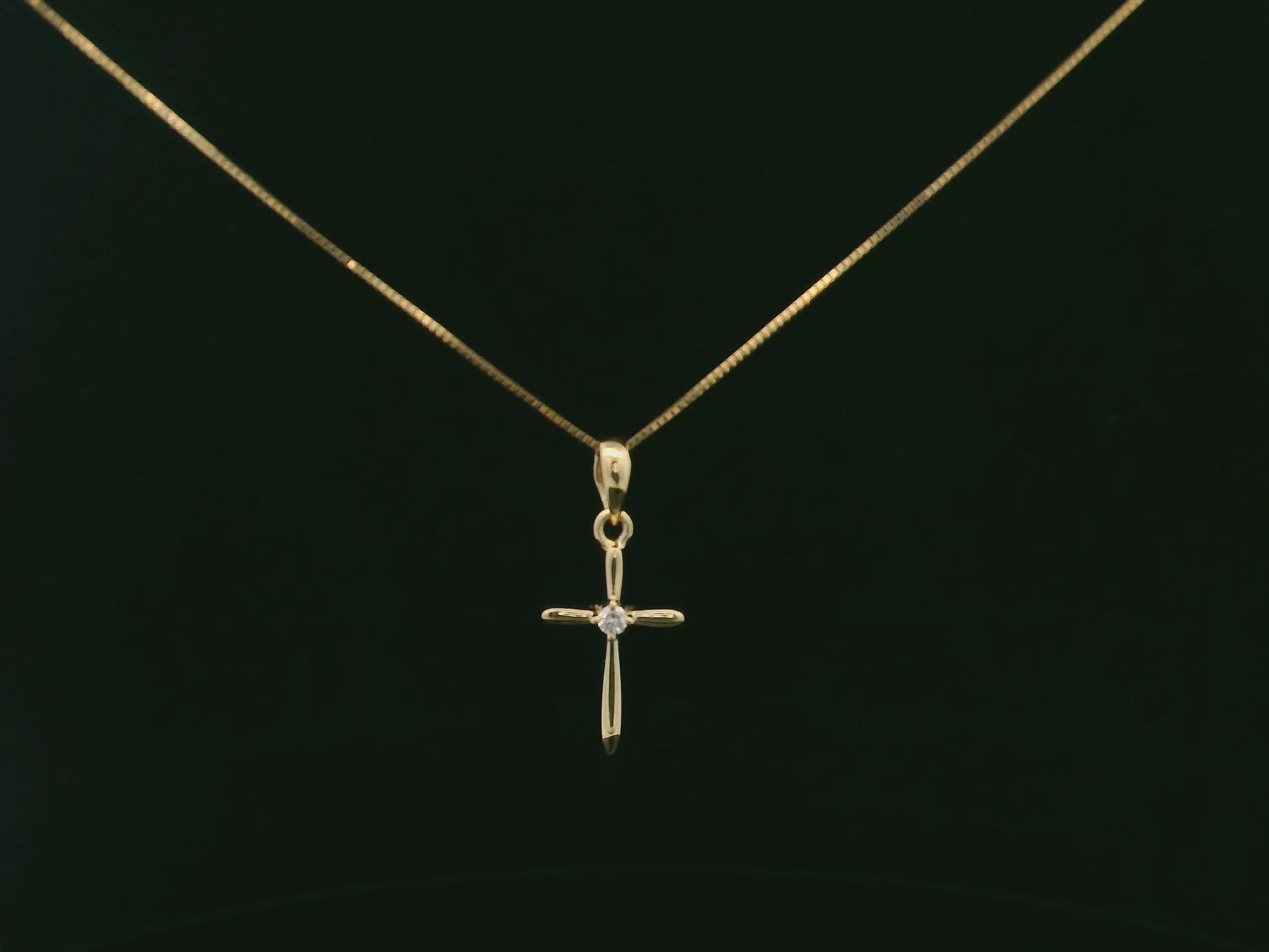 0.02 carat diamond cross pendant in 18K yellow gold minimalist necklace by Emirates Diamonds