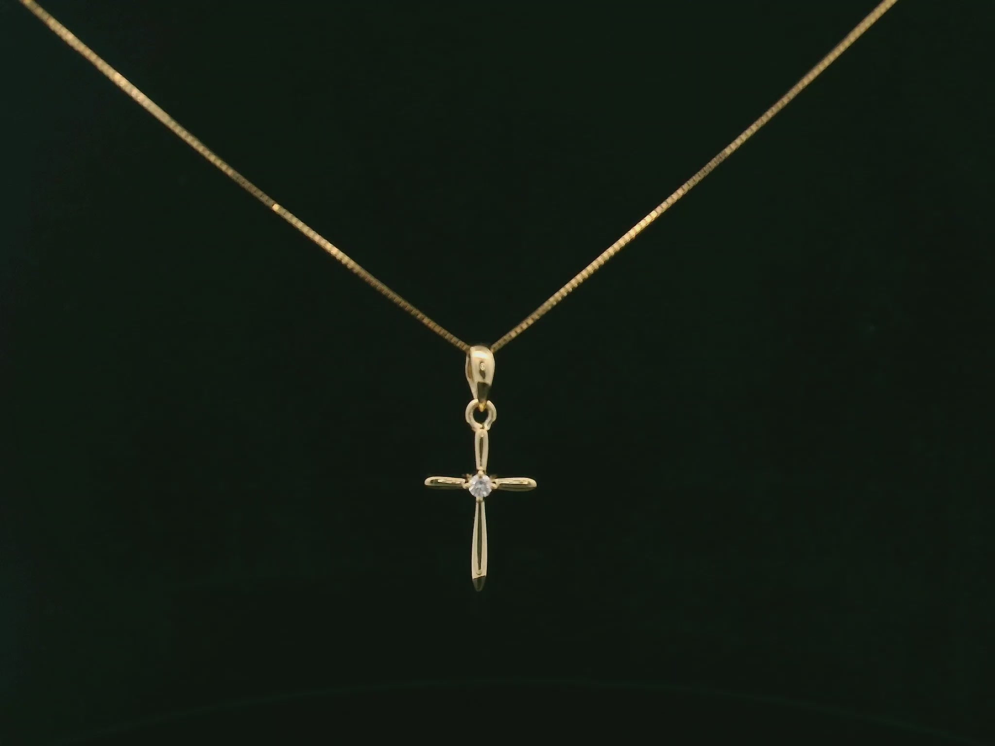 0.02 carat diamond cross pendant in 18K yellow gold minimalist necklace by Emirates Diamonds