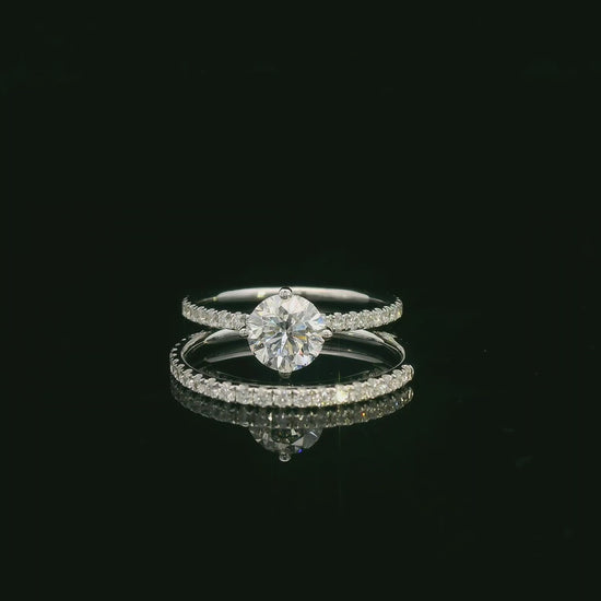 Diamond bridal ring set with GIA certified center stone in 18K white gold by Emirates Diamonds
