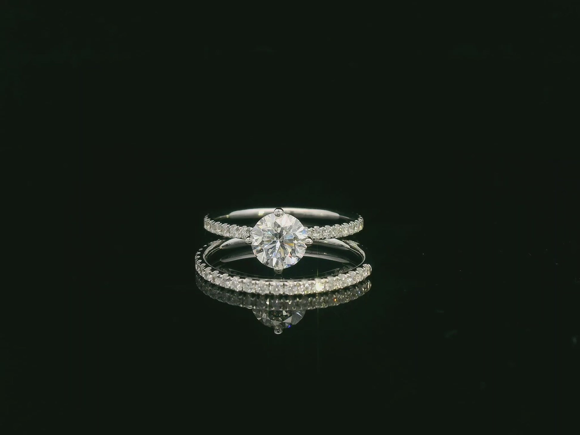 Diamond bridal ring set with GIA certified center stone in 18K white gold by Emirates Diamonds