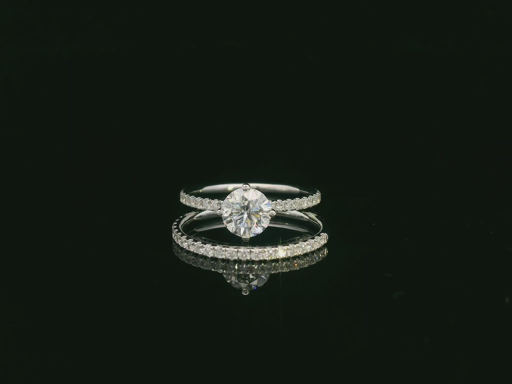 Diamond bridal ring set with GIA certified center stone in 18K white gold by Emirates Diamonds