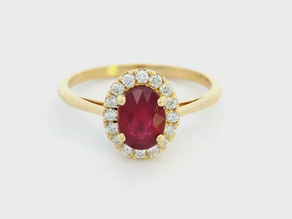 1.18 Carat Oval Ruby Ring with 0.19 Carat Diamond Halo in 18K Gold