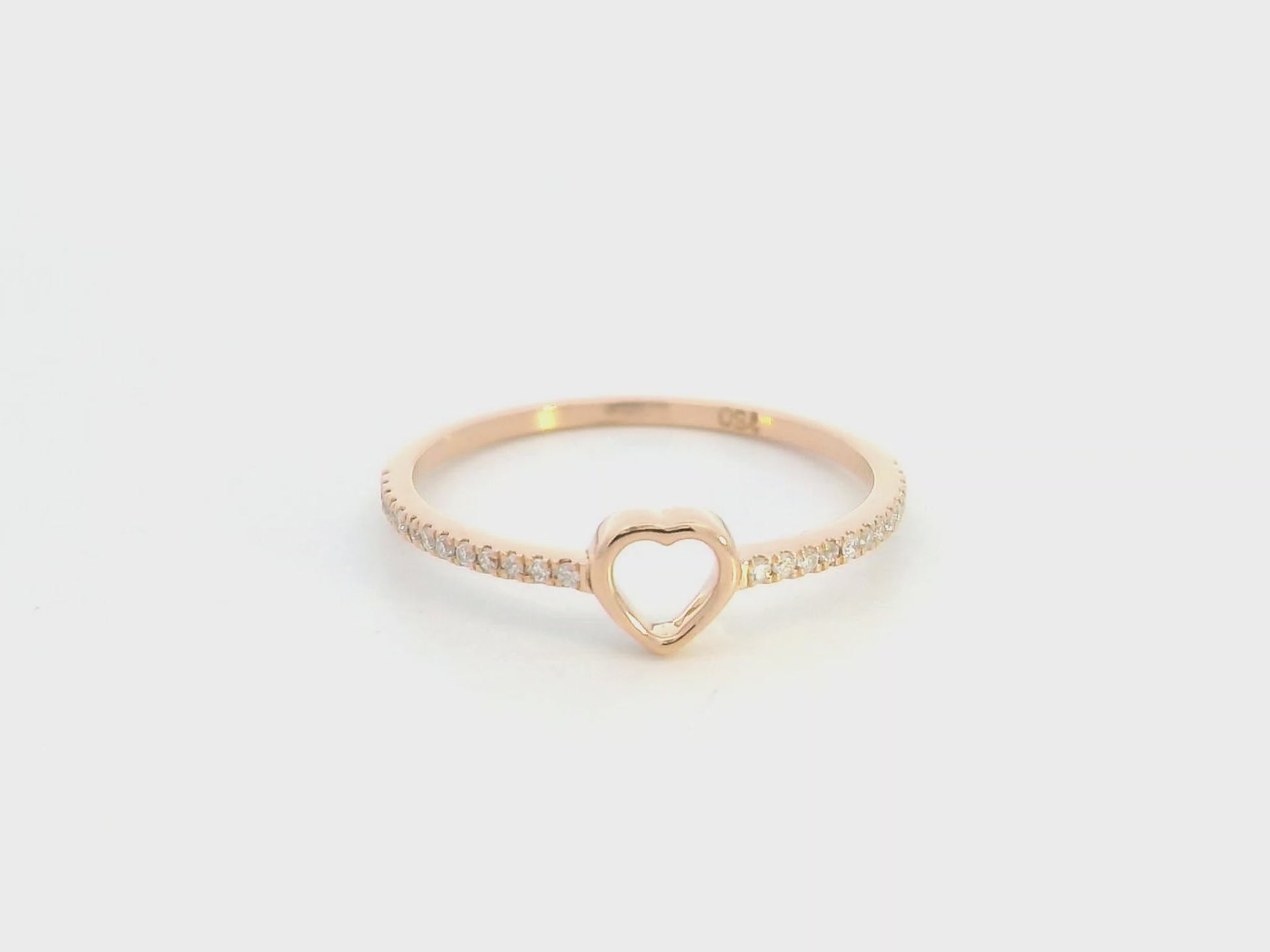 18K rose gold diamond heart ring with pavé-set diamonds and minimalist open heart design.