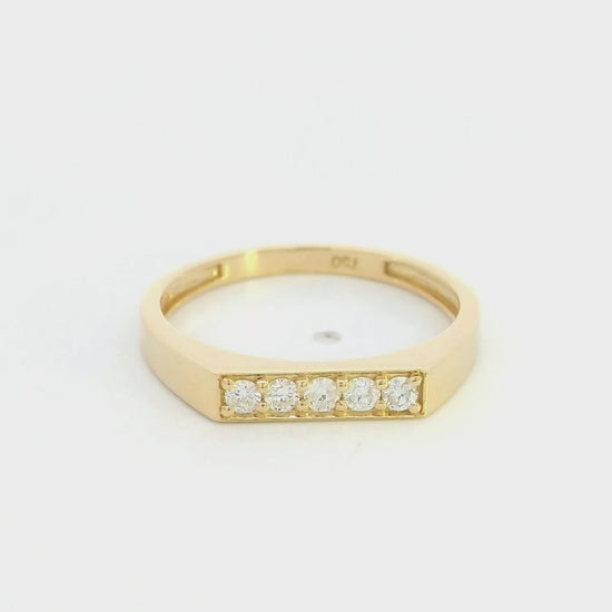 18K yellow gold diamond bar band ring with modern minimalist design.