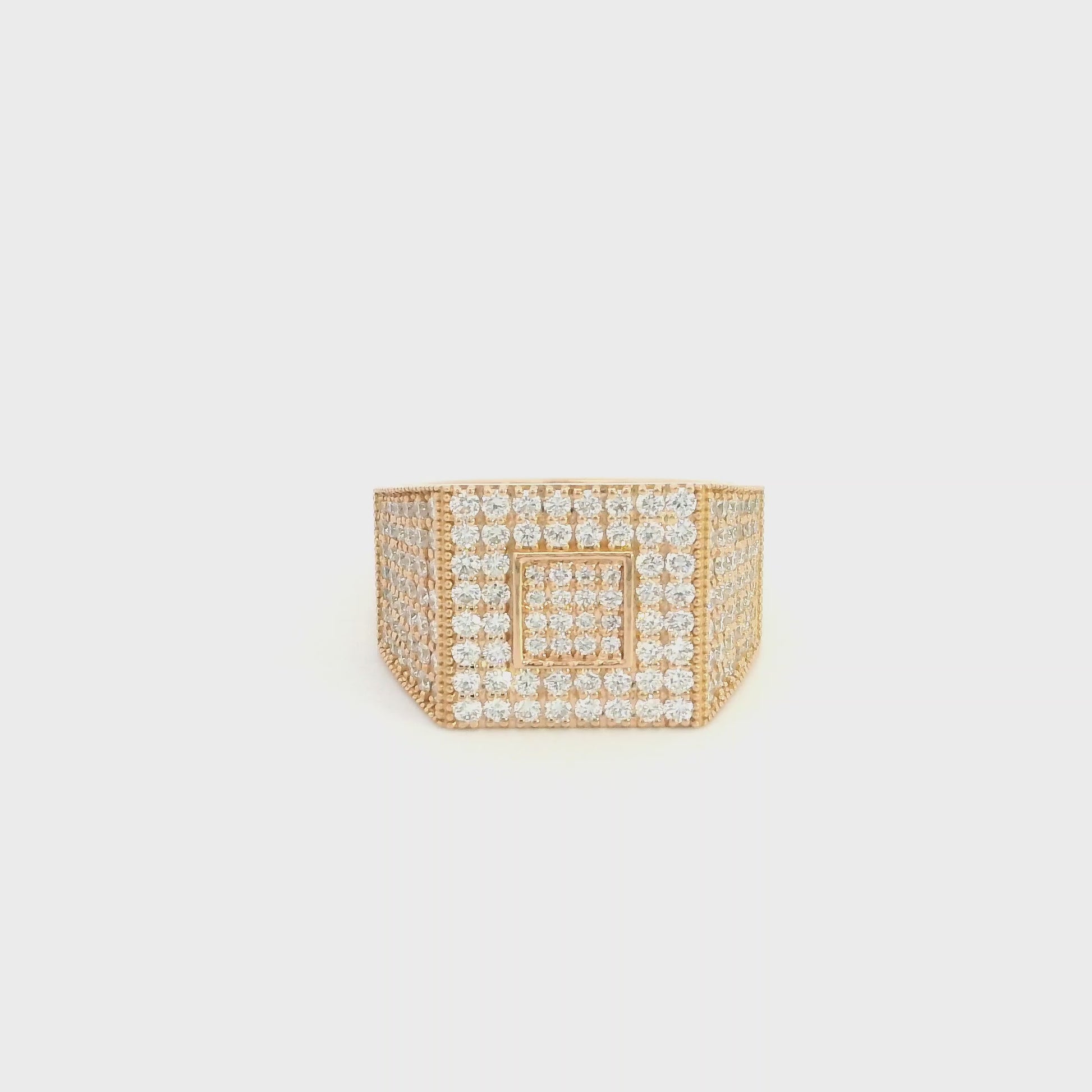 Men’s diamond statement ring in 18K rose gold with a rectangular pavé diamond face, geometric centre and diamond-set sides