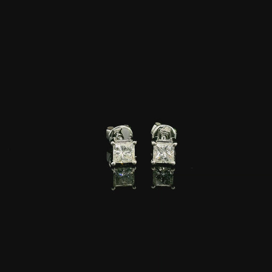 Princess cut diamond stud earrings in 18K white gold with 0.58 carat total natural diamond weight