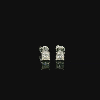 Princess cut diamond stud earrings in 18K white gold with 0.58 carat total natural diamond weight