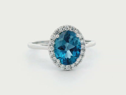 2.22 Carat London Blue Topaz Ring with Diamond Halo in 18K White Gold