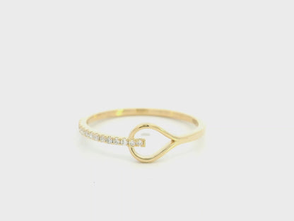 18K yellow gold open teardrop diamond ring with minimalist modern design.
