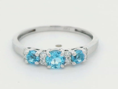 18k White Gold Blue Topaz and Diamond Ring.