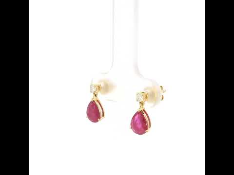 Pear shaped ruby and diamond drop earrings in 18K yellow gold with round diamond accents