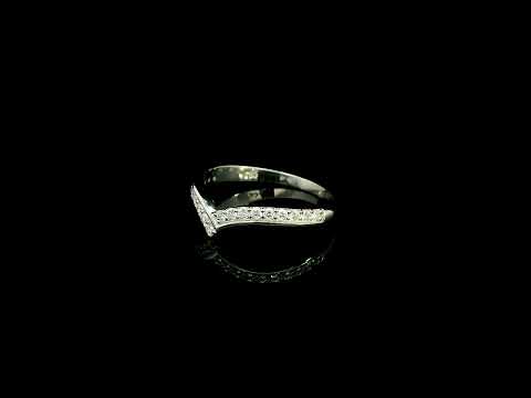 18K white gold chevron diamond wedding band featuring 0.27 carat natural round brilliant diamonds in a pavé setting.