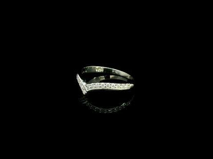 18K white gold chevron diamond wedding band featuring 0.27 carat natural round brilliant diamonds in a pavé setting.