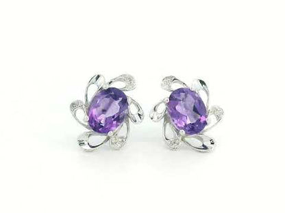 18K white gold amethyst stud earrings with oval purple gemstones and diamond halo in floral setting, elegant fine jewelry