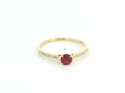 Ruby and diamond solitaire ring in 18K yellow gold featuring a 0.36 carat natural ruby and 0.11 carat diamonds