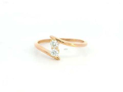 Diamond open bypass ring in 18K rose gold