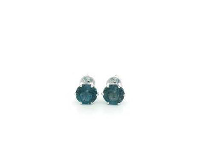London Blue Topaz solitaire stud earrings in 18K white gold featuring 1.90 carats of natural round London Blue Topaz.