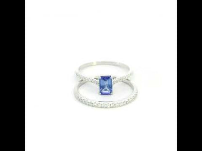 Tanzanite bridal set in 18K white gold with emerald cut tanzanite engagement ring and diamond wedding band