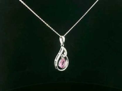 18k white gold pendant with 0.68 CT pear-shaped pink sapphire and 0.05 CT diamond accents