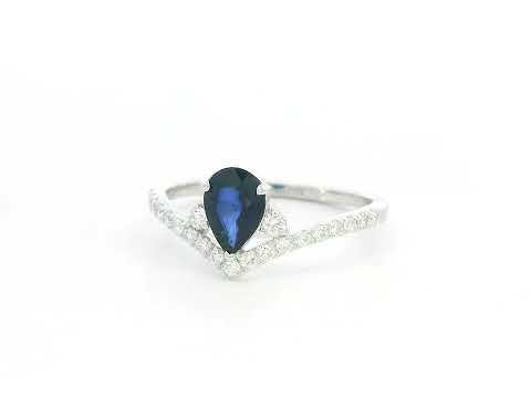 Pear blue sapphire diamond V shape ring in 18K white gold wishbone design Emirates Diamonds