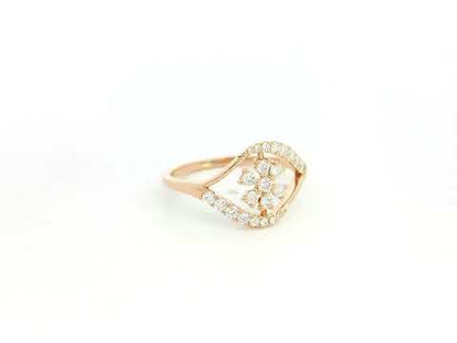 18K rose gold diamond floral cluster ring with geometric halo frame design