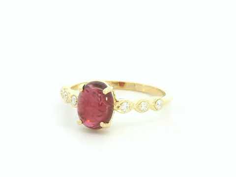 18K yellow gold ring with 1.66ct cabochon ruby and 0.10ct diamond accents – Emirates Diamonds.