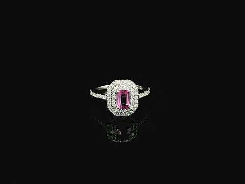 18K white gold pink sapphire halo ring featuring a 0.55 carat emerald-cut pink sapphire surrounded by a double halo of natural diamonds totaling 0.40 carat.