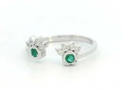18K gold open band ring with emerald and diamond paw motifs