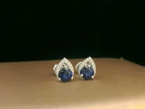 18K white gold teardrop halo stud earrings with round blue sapphires and diamonds