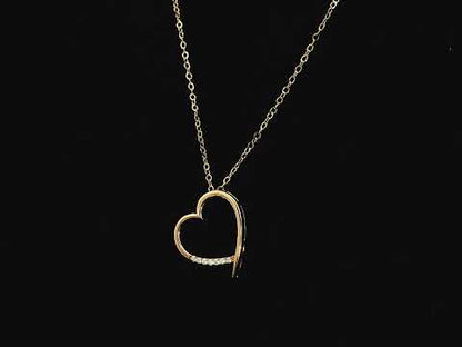 Diamond heart pendant necklace in 18K yellow gold with chain by Emirates Diamonds