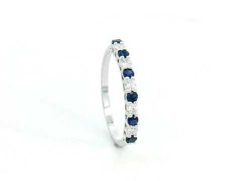 18K white gold half eternity ring with alternating 0.28 CT blue sapphires and 0.18 CT diamonds, perfect as a wedding or stacking ring.