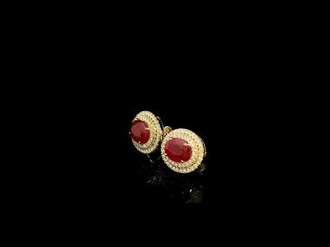 Oval ruby and double diamond halo stud earrings in 18K yellow gold by Emirates Diamonds.