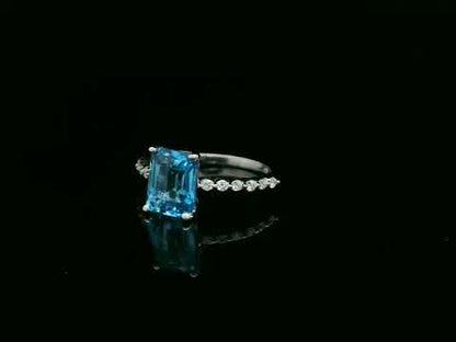 Emerald cut Swiss blue topaz diamond ring in 18K white gold Emirates Diamonds