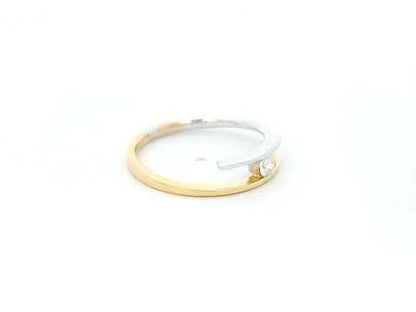 Two-tone diamond open wrap ring in 18K yellow and white gold with round diamond