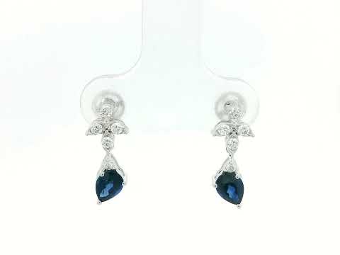 18k white gold floral stud earrings with 0.79 carat pear-cut blue sapphires dangling from 0.16 carat diamond clusters
